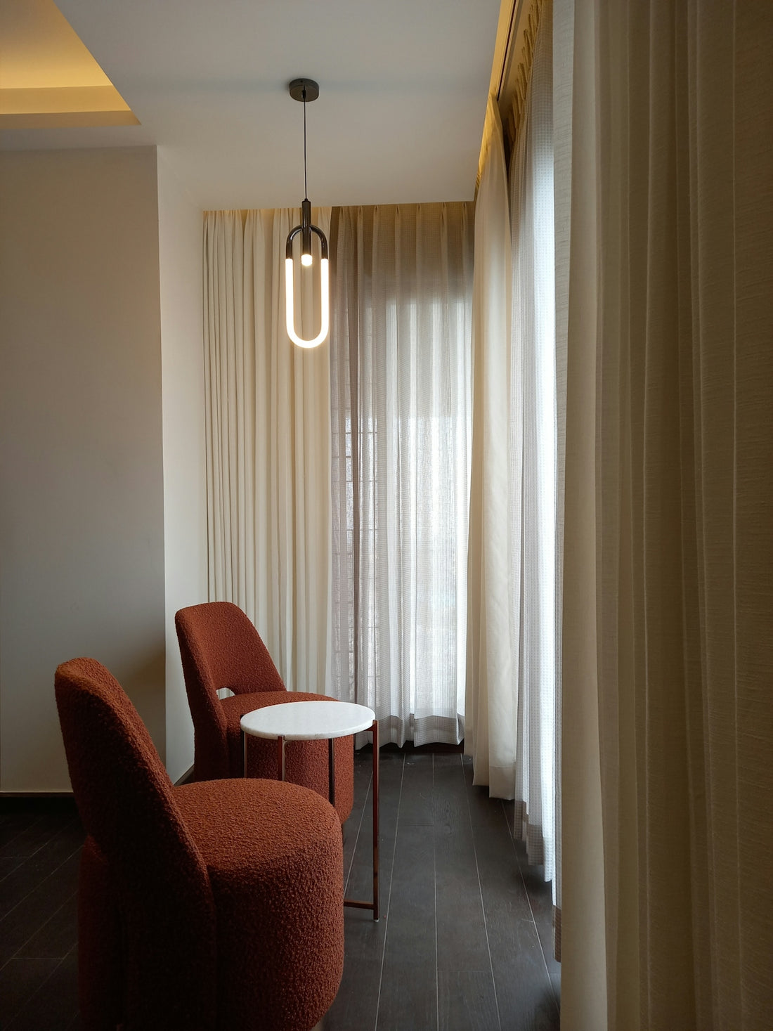 two chairs and a table in a room